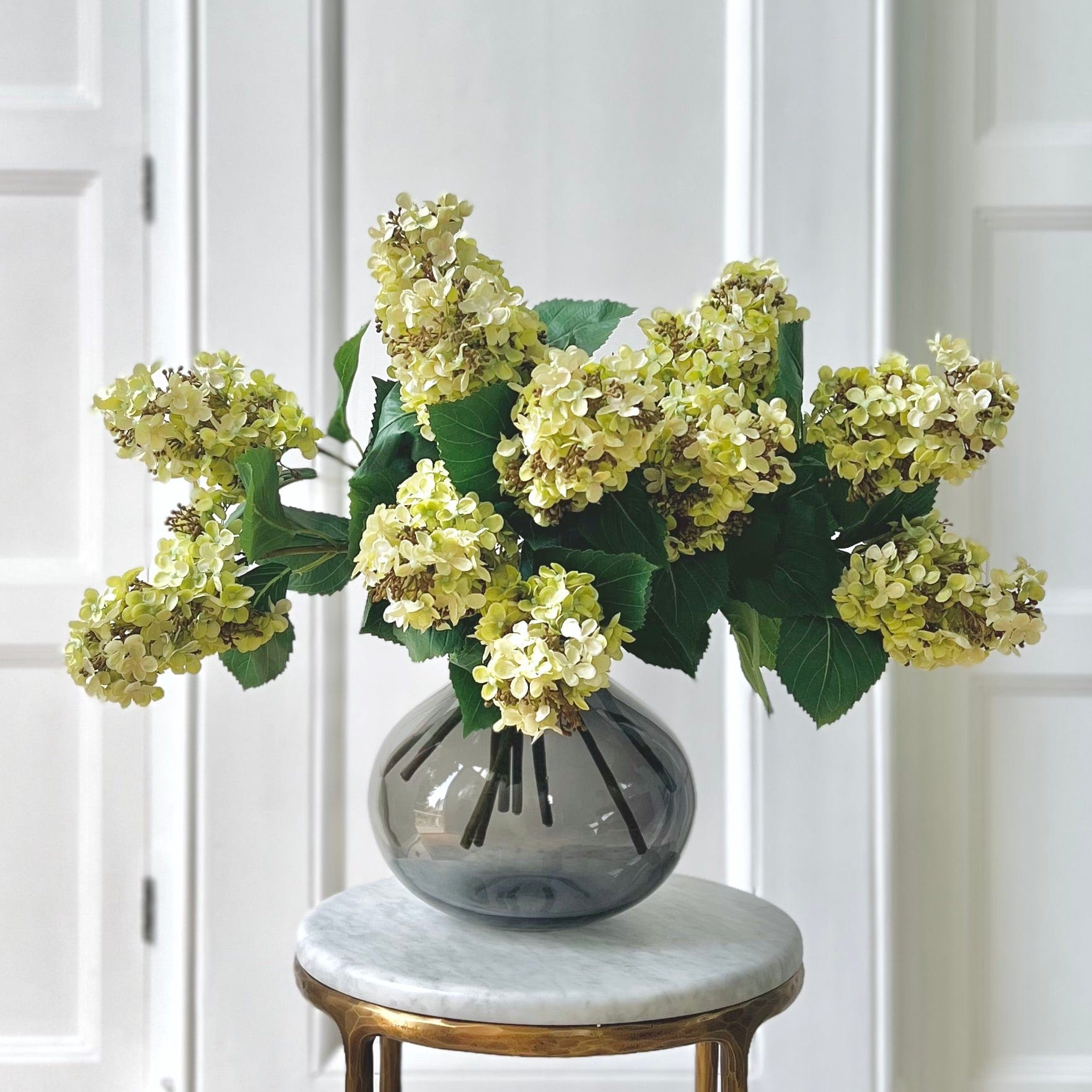 Realistic Green Paniculata Hydrangea Bouquet & Smoky Grey Bulb Vase Set ABX5004GR-10 + ABV0203 by The Faux Flower Company