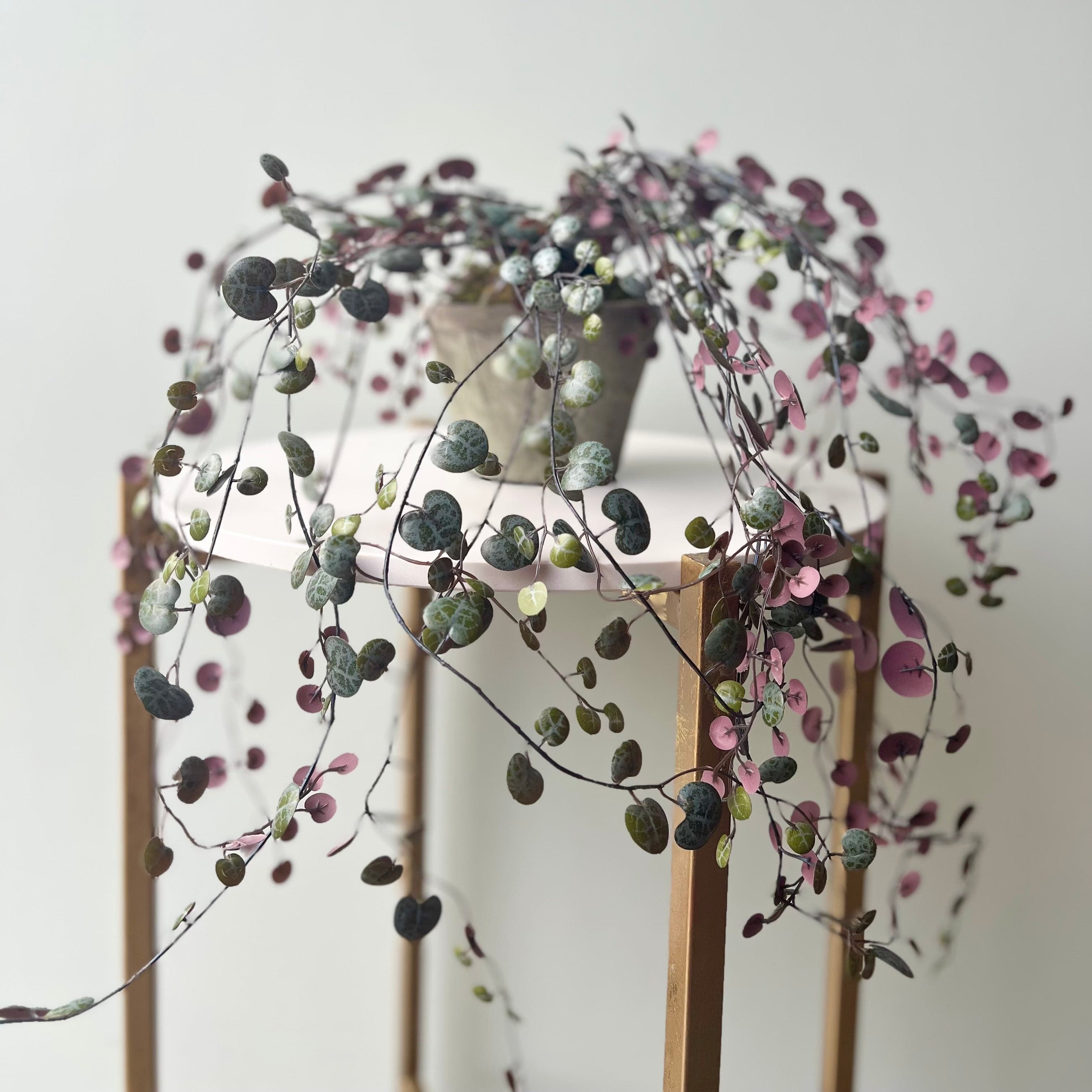 Realistic Artificial Purple Hanging Angel Vine Plant with Grey Cement Pot AHCH-0781 by The Faux Flower Company
