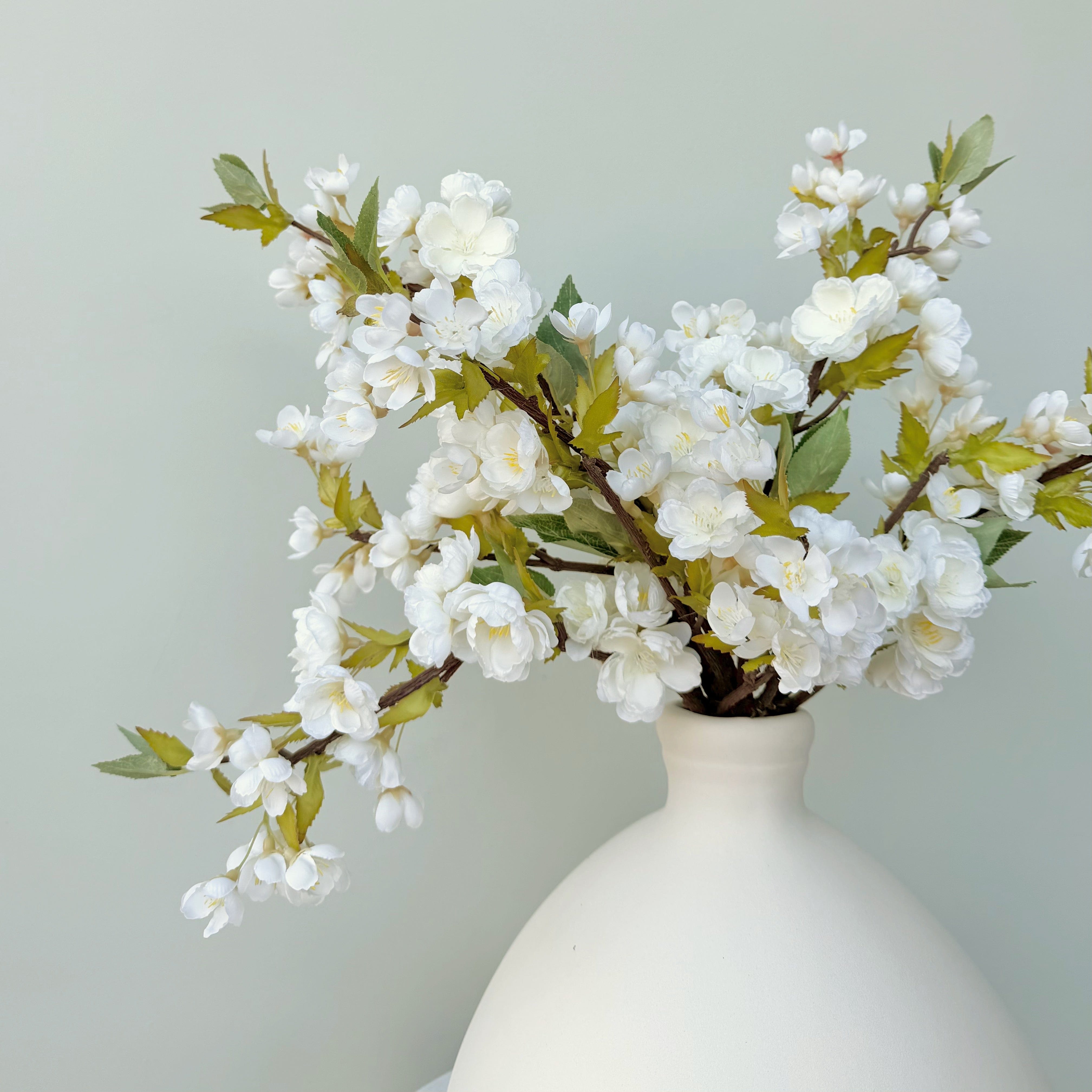 Realistic Artificial Short White Cherry Blossom Branch ABX1951WH by The Faux Flower Company