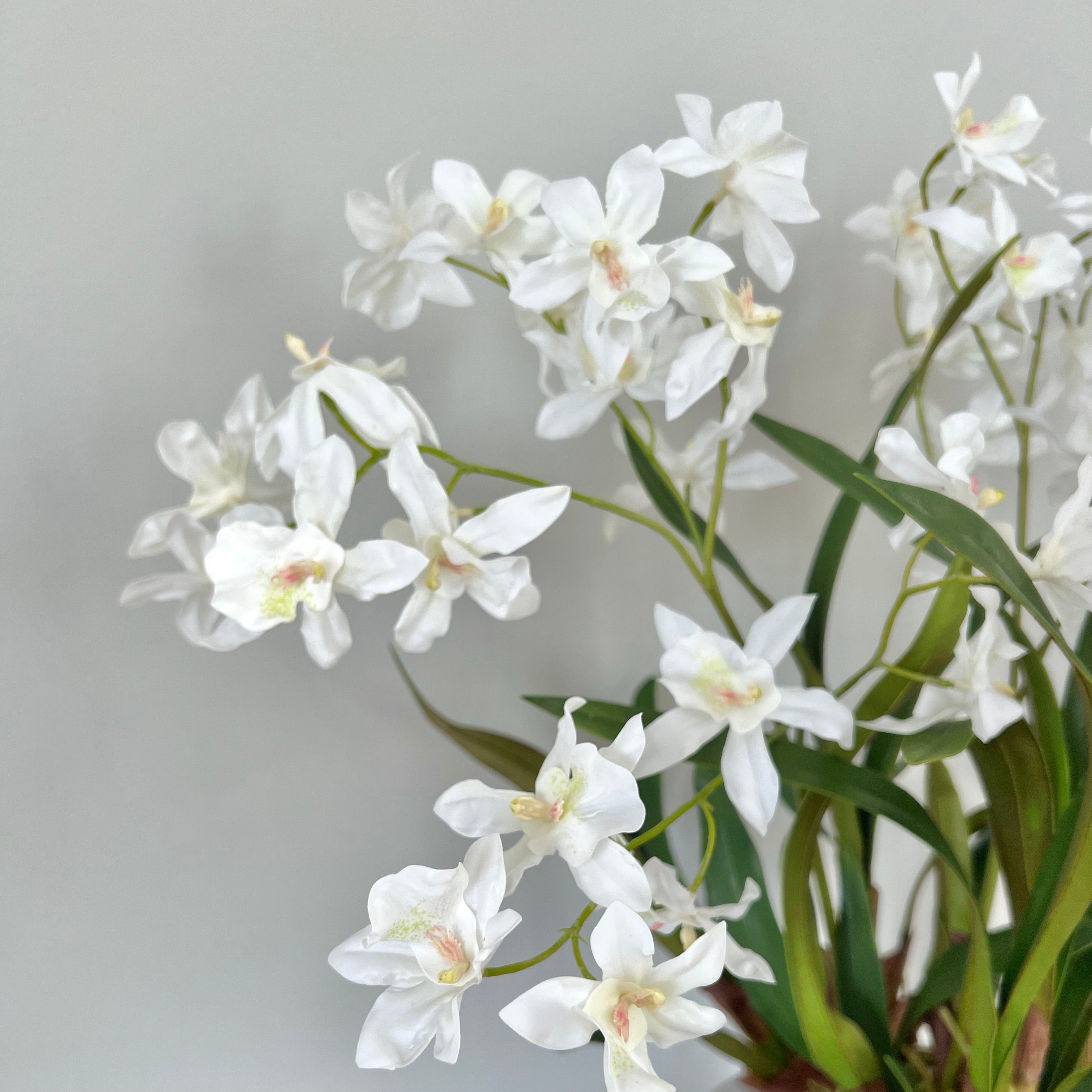 Realistic White Artificial Dendrobium Orchid Plant ABY2062WH by The Faux Flower Company