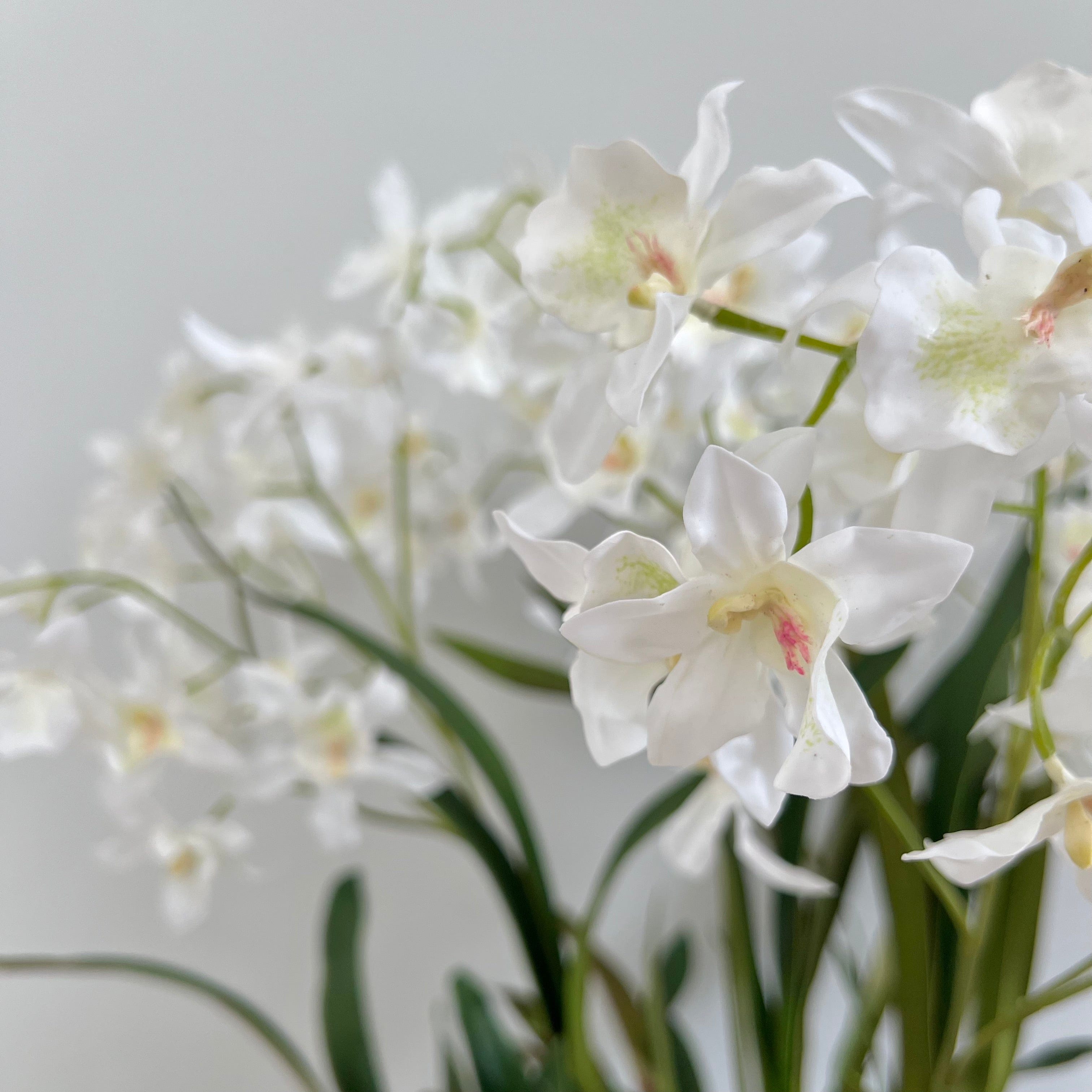 Realistic White Artificial Dendrobium Orchid Plant ABY2062WH by The Faux Flower Company