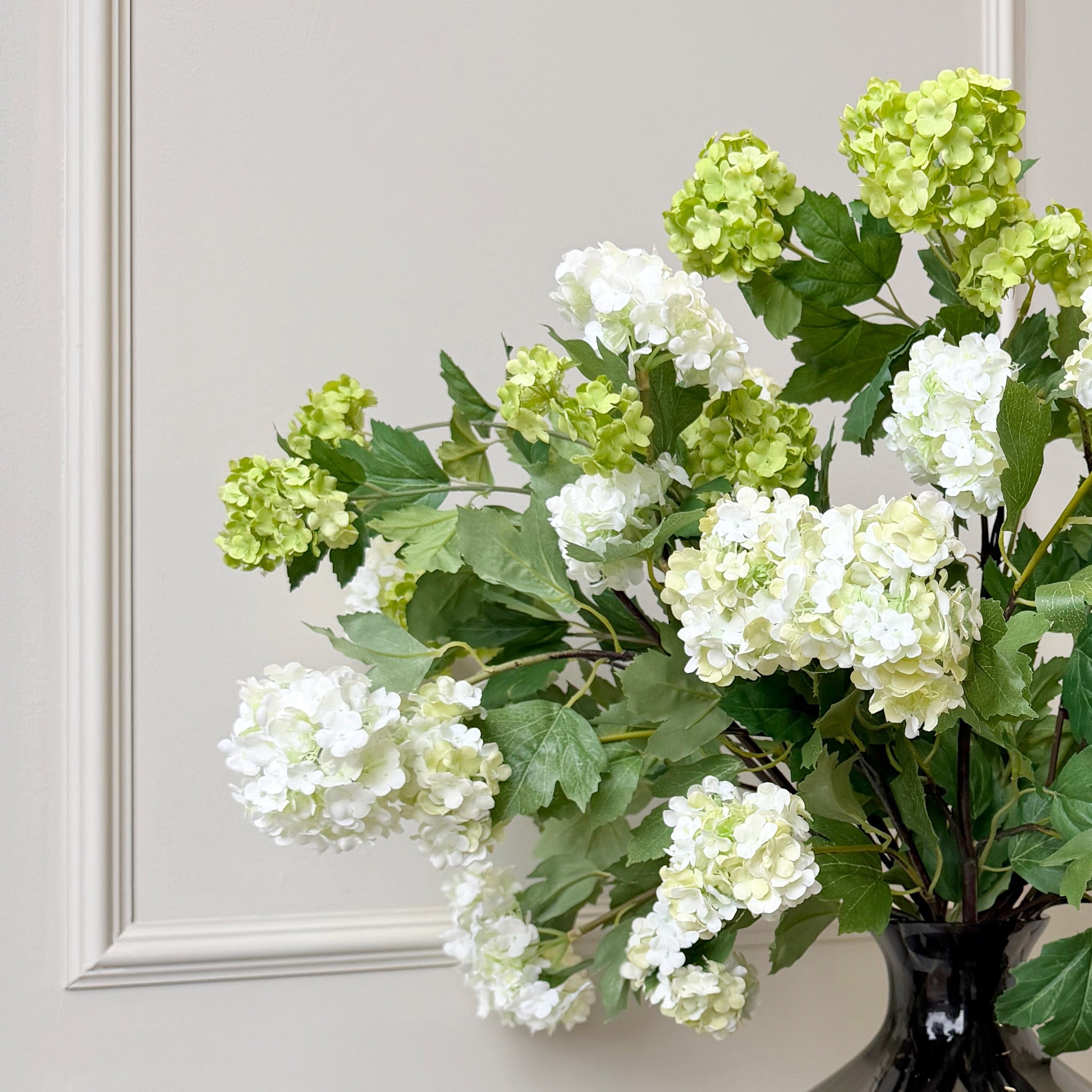Realistic Artificial Spring Greens Flower Arrangement by The Faux Flower Company
