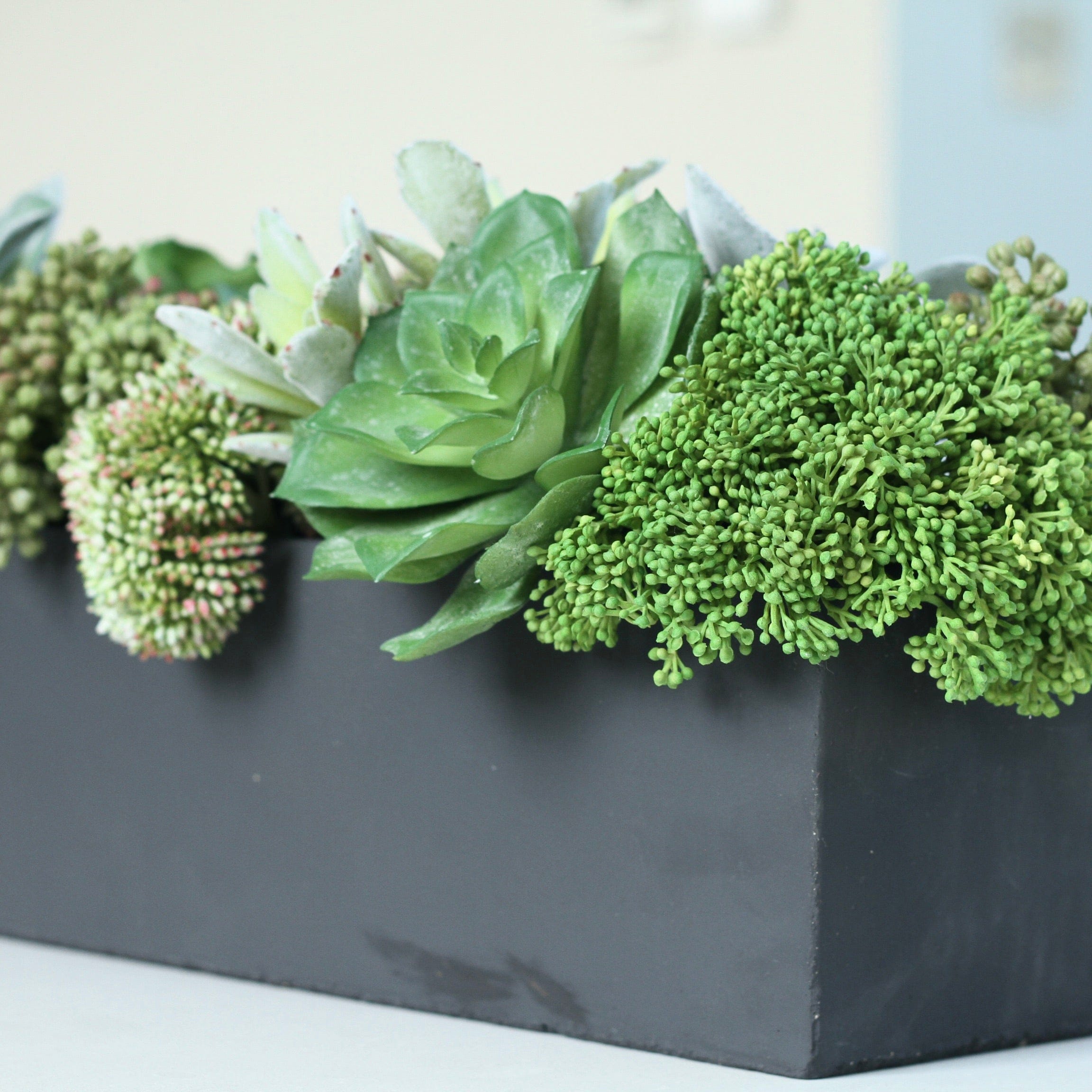 Realistic Green Succulent & Skimmia Arrangement AHCH-803 by The Faux Flower Company