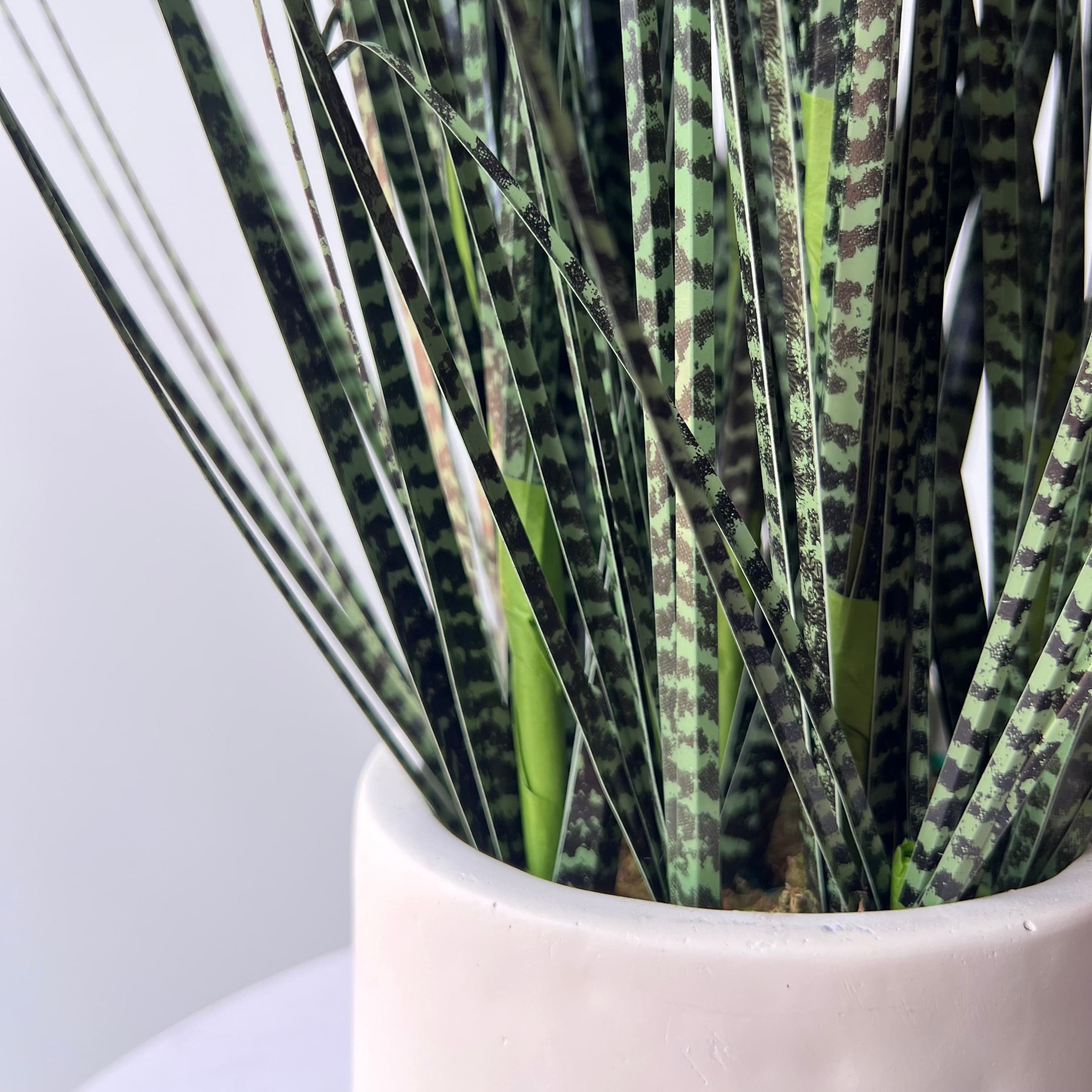 Realistic Artificial Mottled Onion Grass in Stone-look Planter AHCH-1523 by The Faux Flower Company