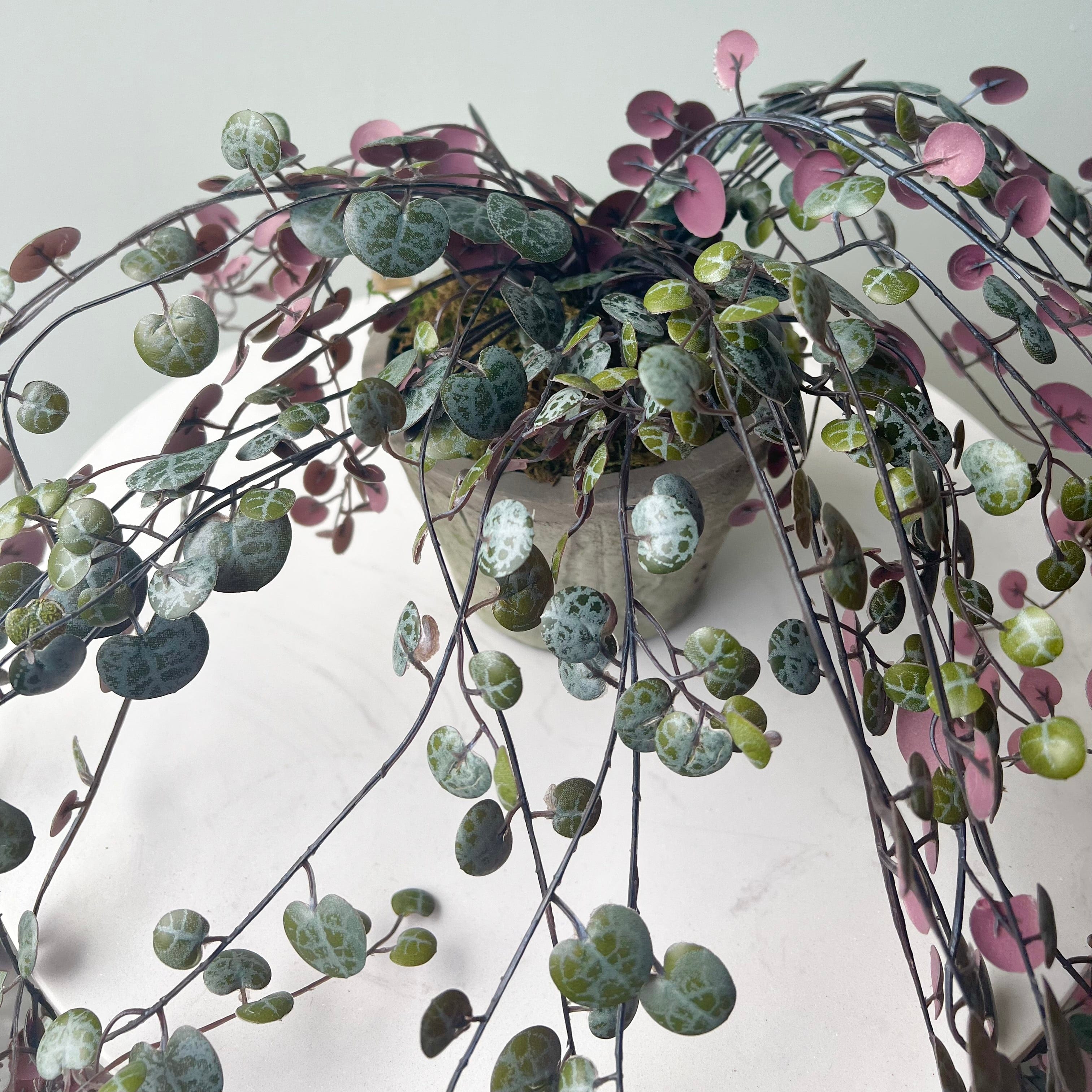 Realistic Artificial Purple Hanging Angel Vine Plant with Grey Cement Pot AHCH-0781 by The Faux Flower Company