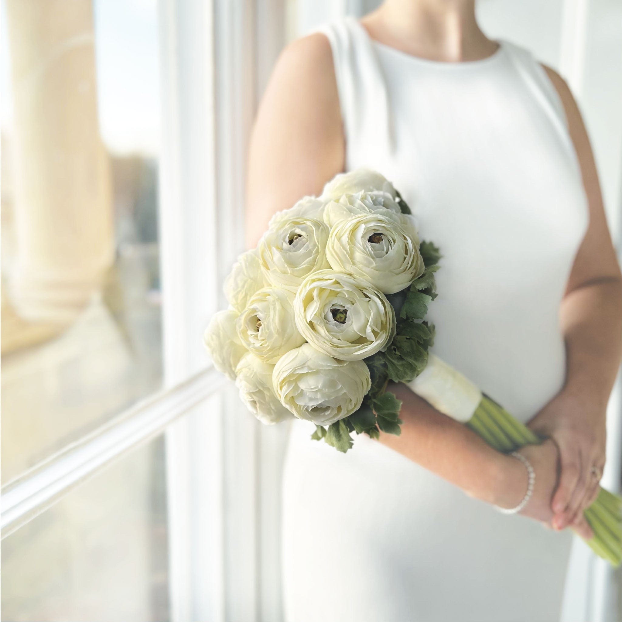 Realistic Artificial White Ranunculus Wedding Arrangement by The Faux Flower Company