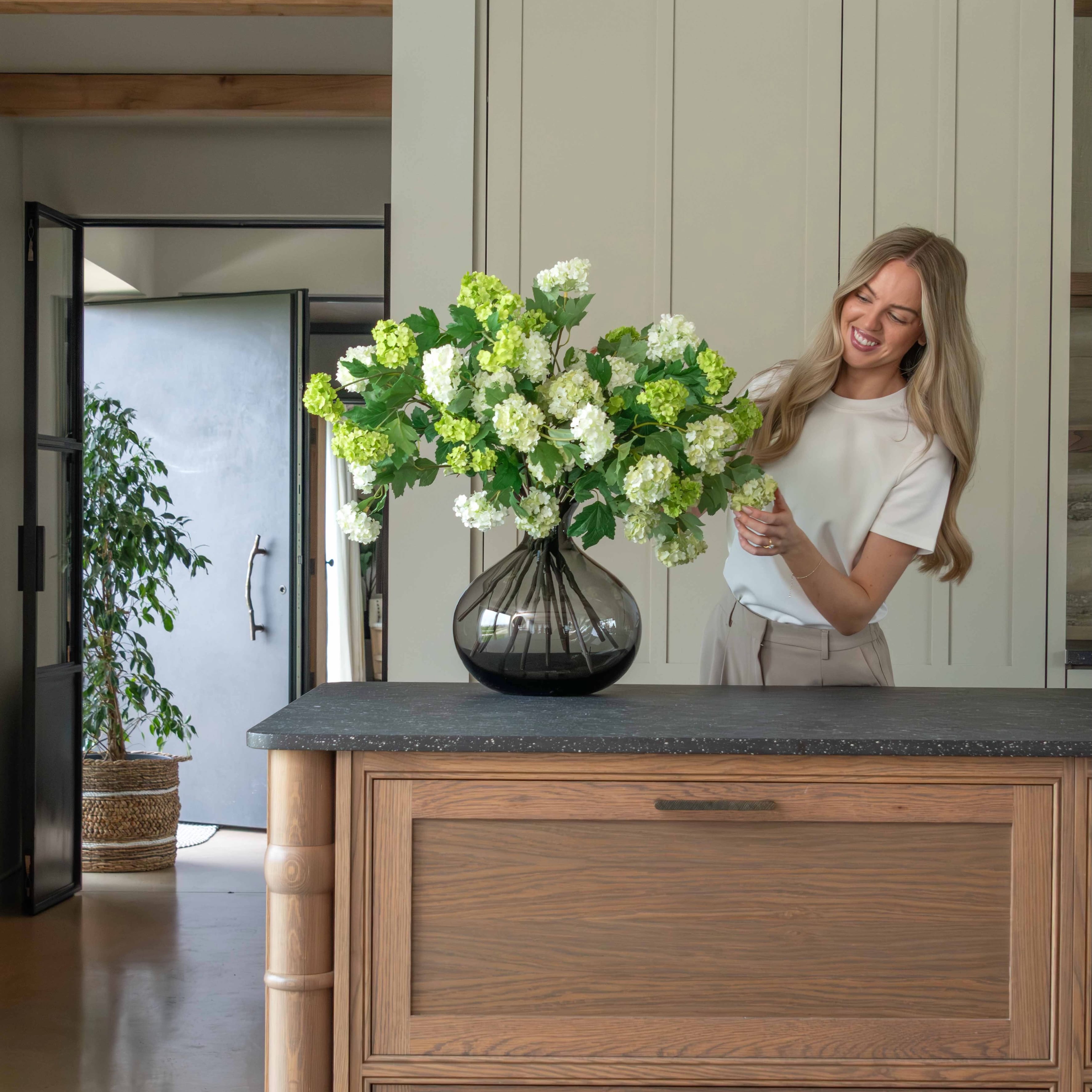 Realistic Spring Greens Artificial Flower Arrangement by The Faux Flower Company